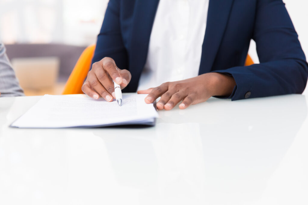 Businesswoman studying contract text Technical Services